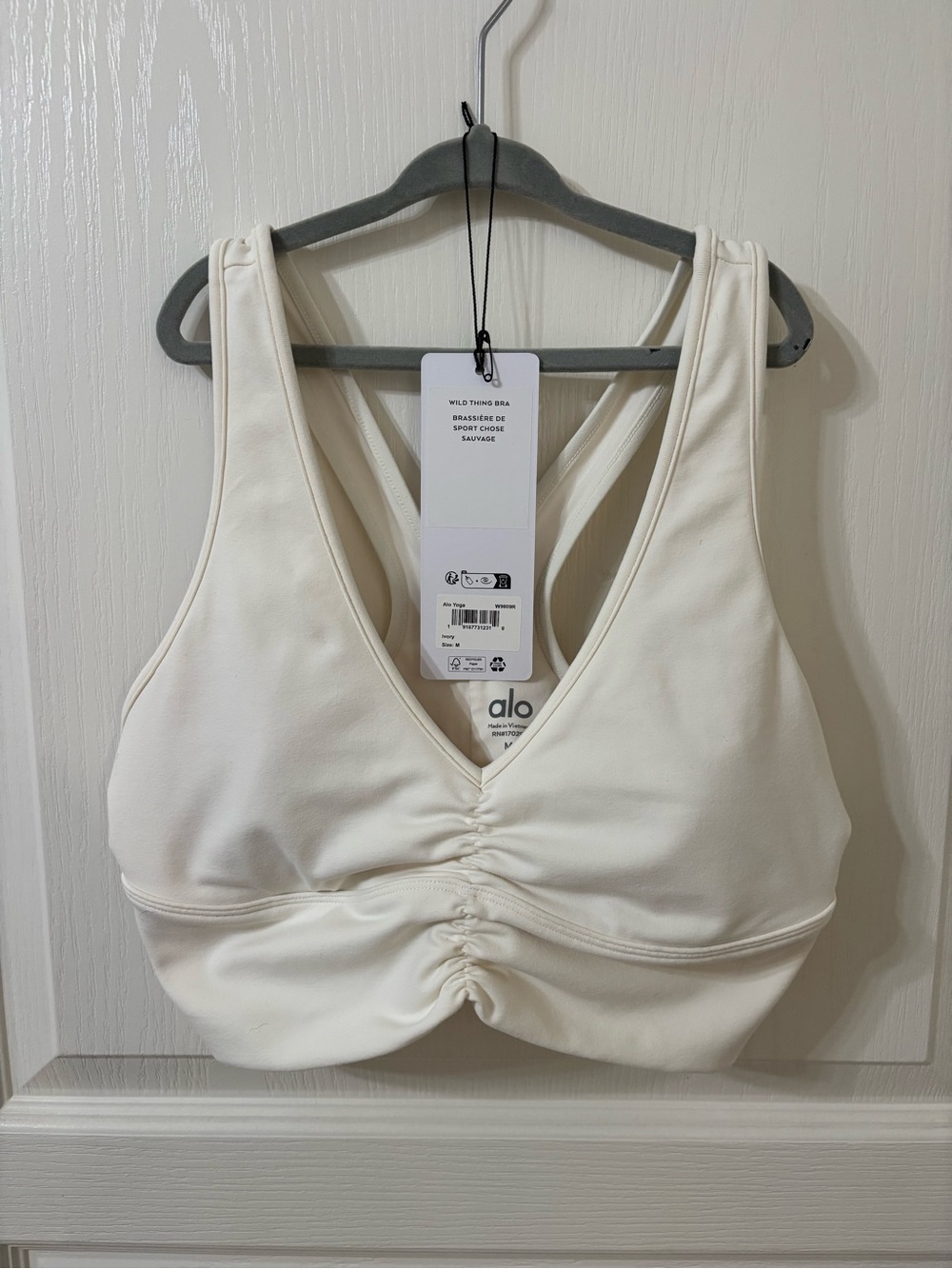 Alo Yoga wild thing bra in ivory size medium